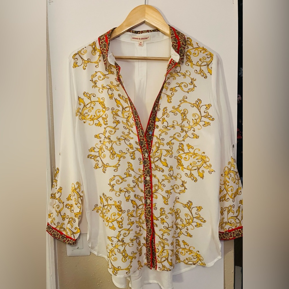 Beautiful button up top. Light and flowy. New without tags